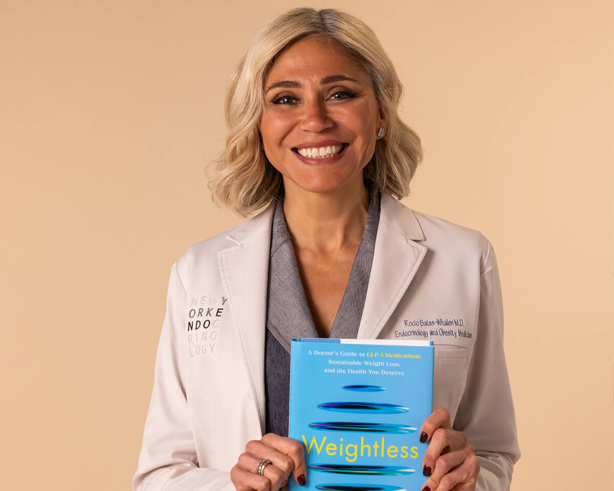 Dr. Roc&iacute;o Salas-Whalen holding her book Weightless